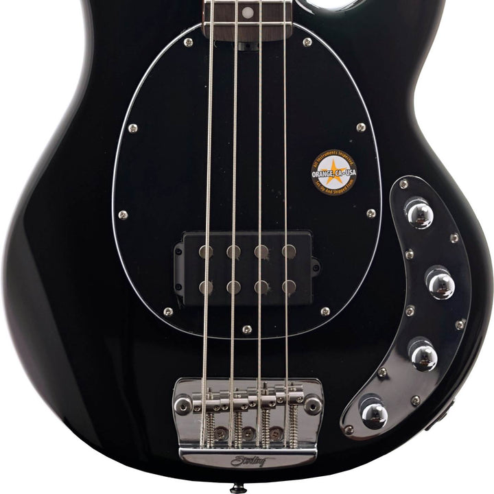  Sterling by Music Man Stingray RAY34 bass guitar body, showing the high-gloss black finish and chrome-plated bridge.