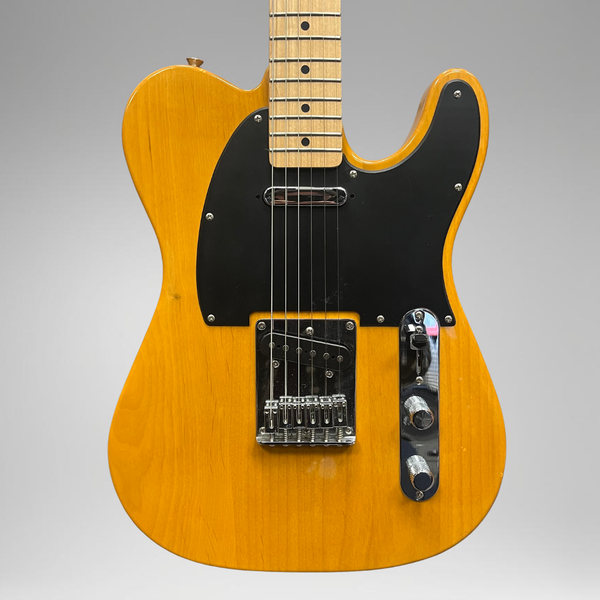 Squier Affinity Telecaster in butterscotch blonde finish with black pickguard – front view