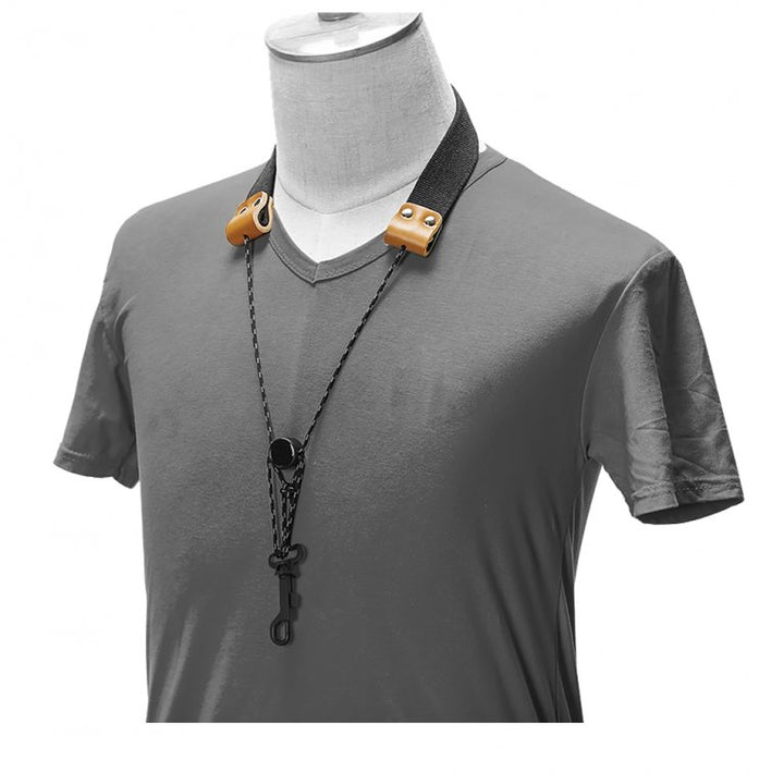 Saxophone strap worn on mannequin with t-shirt, showing neck fit

