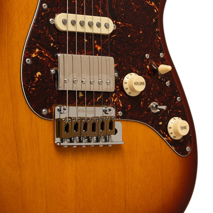 Close-up of front body, pickups, and tortoise pickguard

