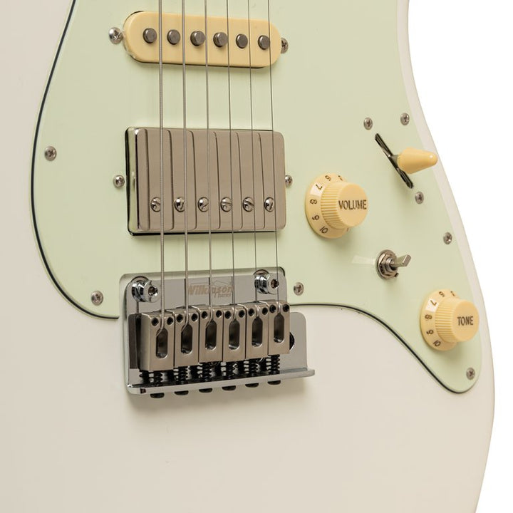 Close-up of Wilkinson tremolo bridge and HSS pickups

