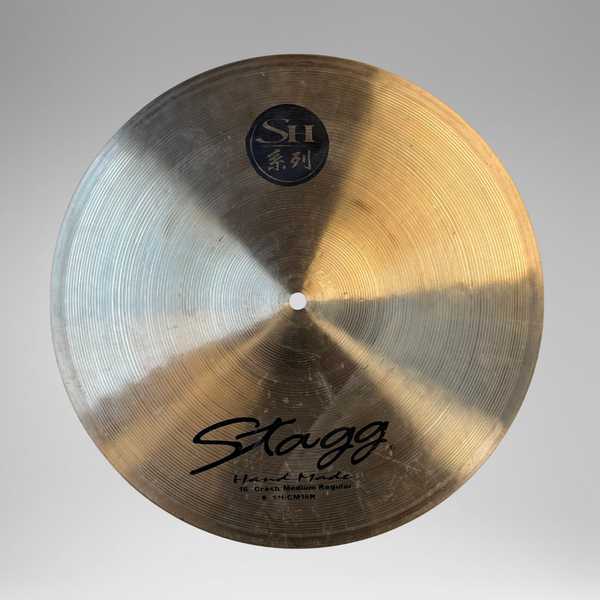 Cymbal with Stagg branding on a gray background
