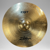 Zildjian cymbal with ZBT logo on a gray background