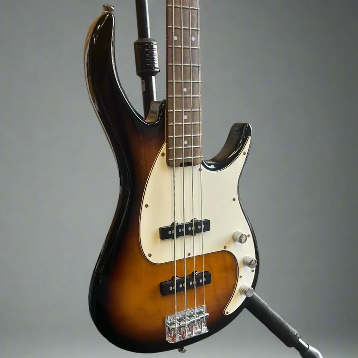 Close-up of P/J pickups on Peavey Milestone BXP bass guitar

