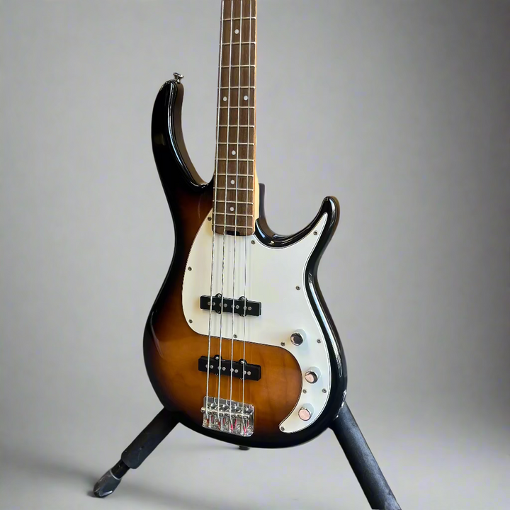 Peavey Milestone BXP headstock showing handcrafted in Vietnam text

