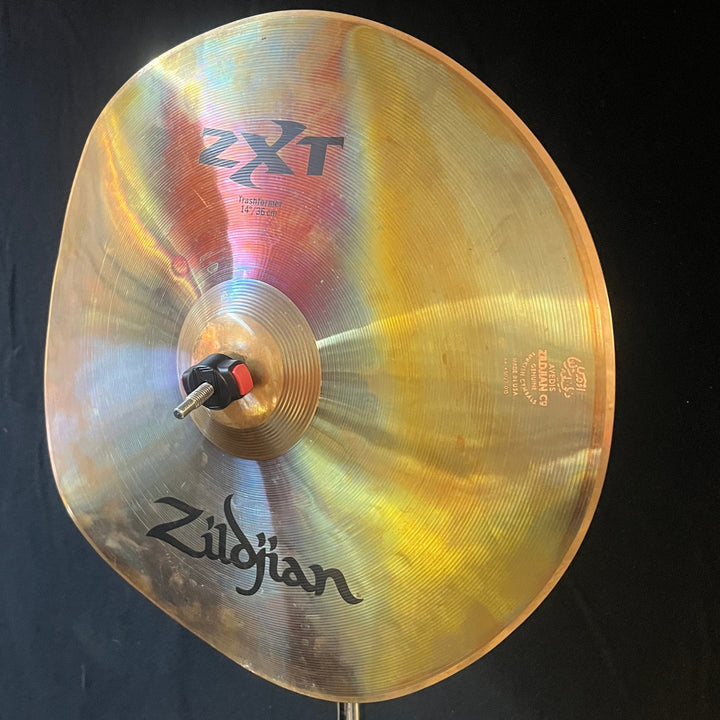 Side view of Zildjian ZXT FX Trashformer cymbal, showcasing its thin profile.
