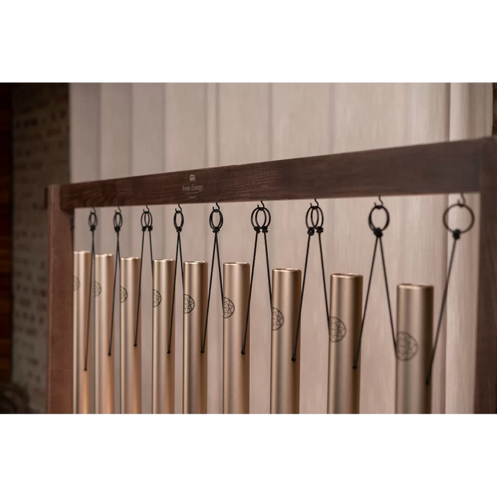 Wooden holders for moving chimes during sound bath