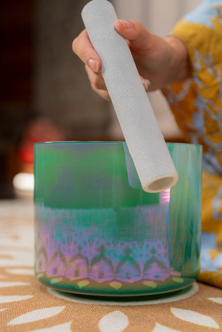 Suede mallet placed beside the Essence Solfeggio Crystal Singing Bowl.