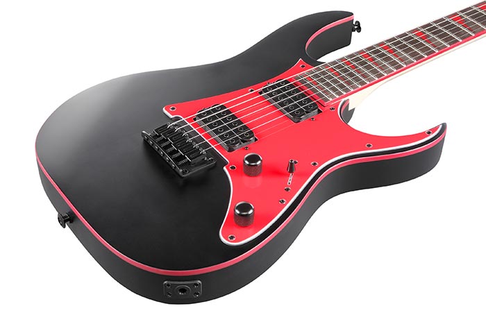 Ibanez GRG131DX Close-up of Maple Neck and Red Sharktooth Inlays
