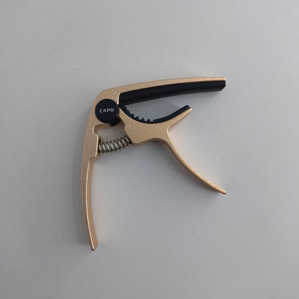 PMC Champagne Trigger Capo - Ev - Entz Music
