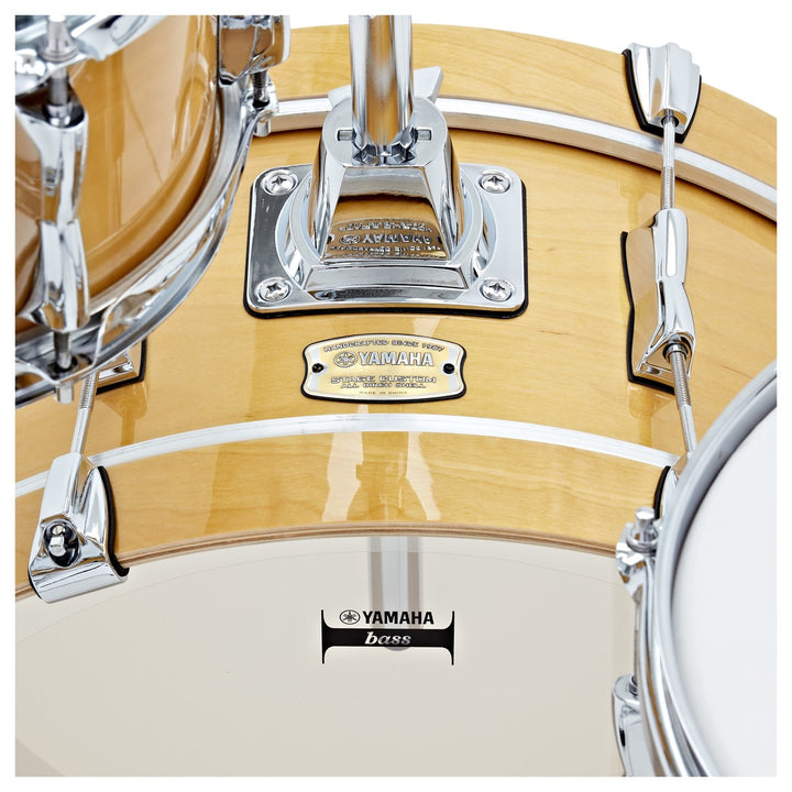 Close-up of Yamaha Stage Custom Hip Natural Wood finish and hardware