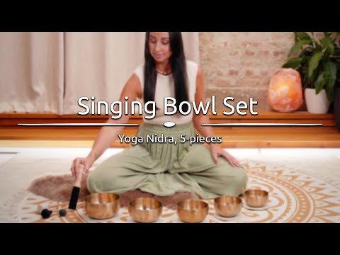 Practitioner using the Meinl Yoga Nidra Singing Bowl Set during a meditation session