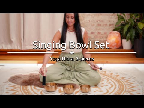 Practitioner using the Meinl Yoga Nidra Singing Bowl Set during a meditation session.